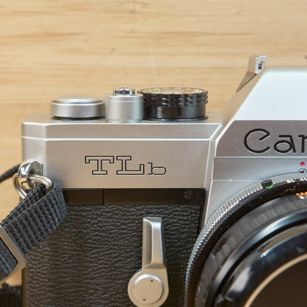 Canon silver and black SLR Film Camera with 50mm Lens - Picture 4 of 10